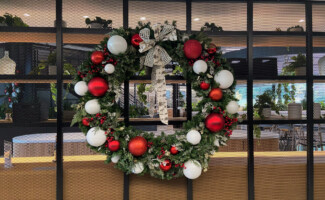 Holiday wreath décor in office